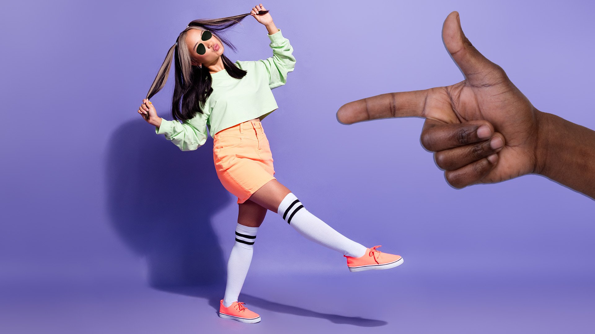 A kpop star practising her dance moves and pouting at the camera